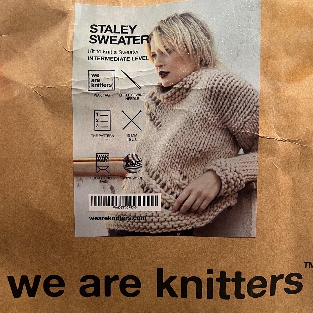 Yarn, needles and sweater pattern kit